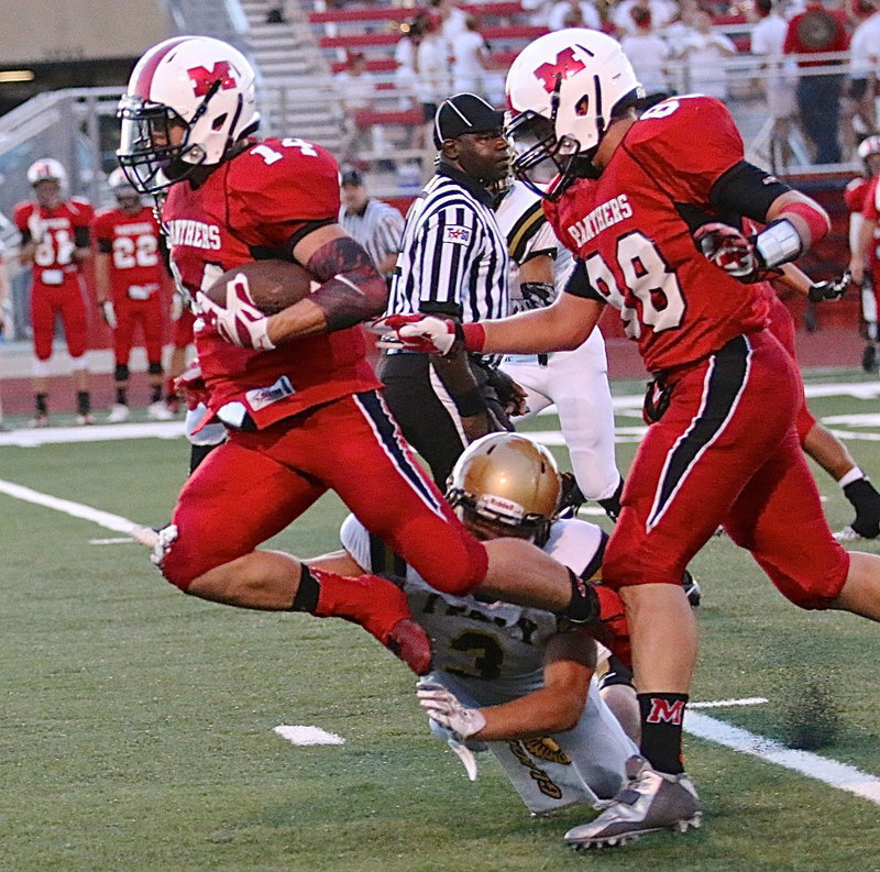 Image: Hunter Merimon(3) trips up a Panther before he can reach Italy’s endzone.