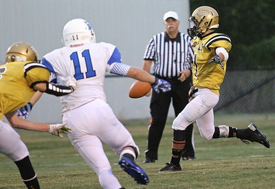 Image: Levi McBride(1) punts it away for Italy. McBride punted 5 times for 142 yards and a 28.4 yard average.
