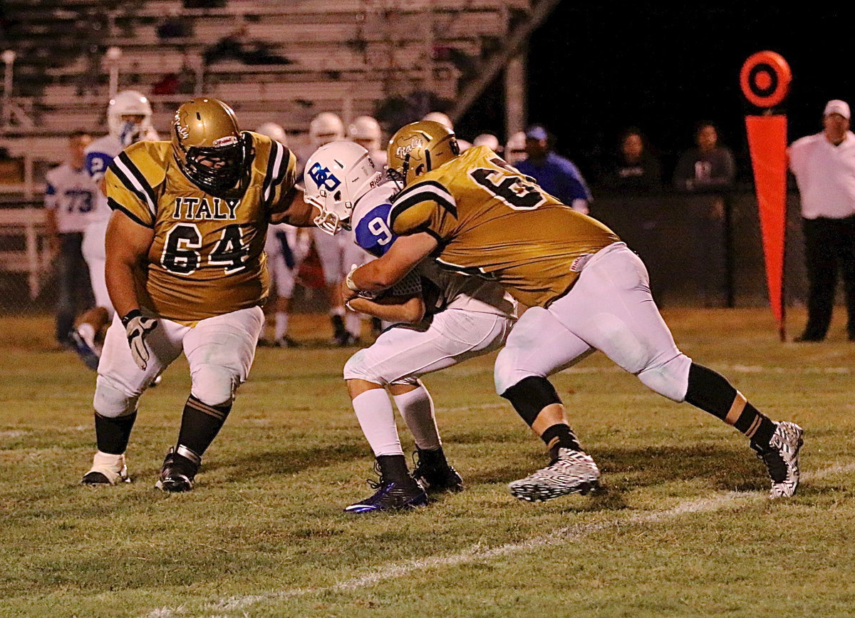 Image: BG’s #9 has no chance as John Byers(60) and teammate Ty Fernandez(64) shutdown a screen pass play attempted by the Lions.