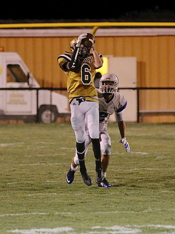 Image: Clayton Miller(6) tries to pick off a Blooming Grove pass attempt. Miller nearly had a pair of picks in the contest.