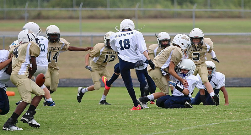 Image: That’s Creighton Hyles(11) tackling the holder and foiling a point-after kick attempt by Rice.