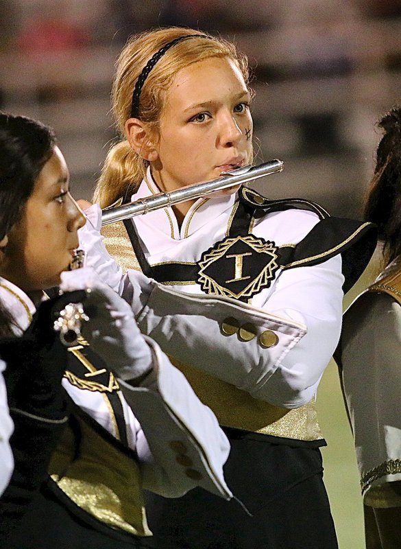Image: Brycelen Richards makes playing the flute look easy.