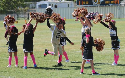 Image: IYAA B-team Gladiator quarterback Jaylon Wallace(2) knows how to celebrate a win!