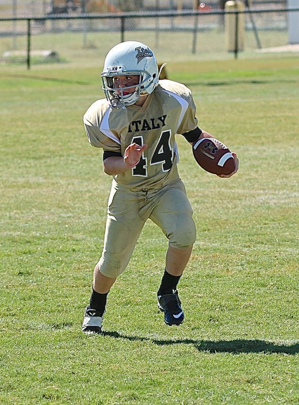 Image: Bryce DeBorde(44) tries to get the edge against Mildred’s defense.