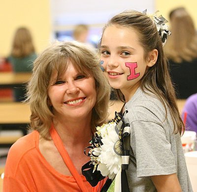 Image: Janett Janek poses with her granddaughter.