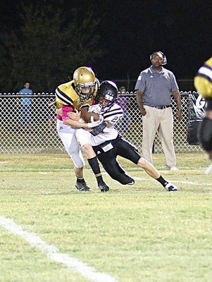 Image: Gladiator defender Clayton Miller(6) intercepts a Dawson pass attempt.