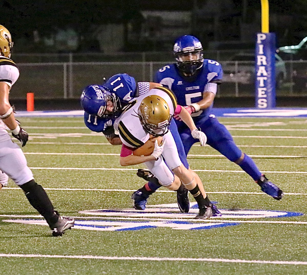 Image: Gladiator receiver Clayton Miller(6) pulls in a pass from teammate Joe Celis.