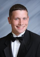 Image: A decorated football athlete and an accomplished track athlete, Coby Jeffords credits his mother, Micki Howard, for being his best supporter.