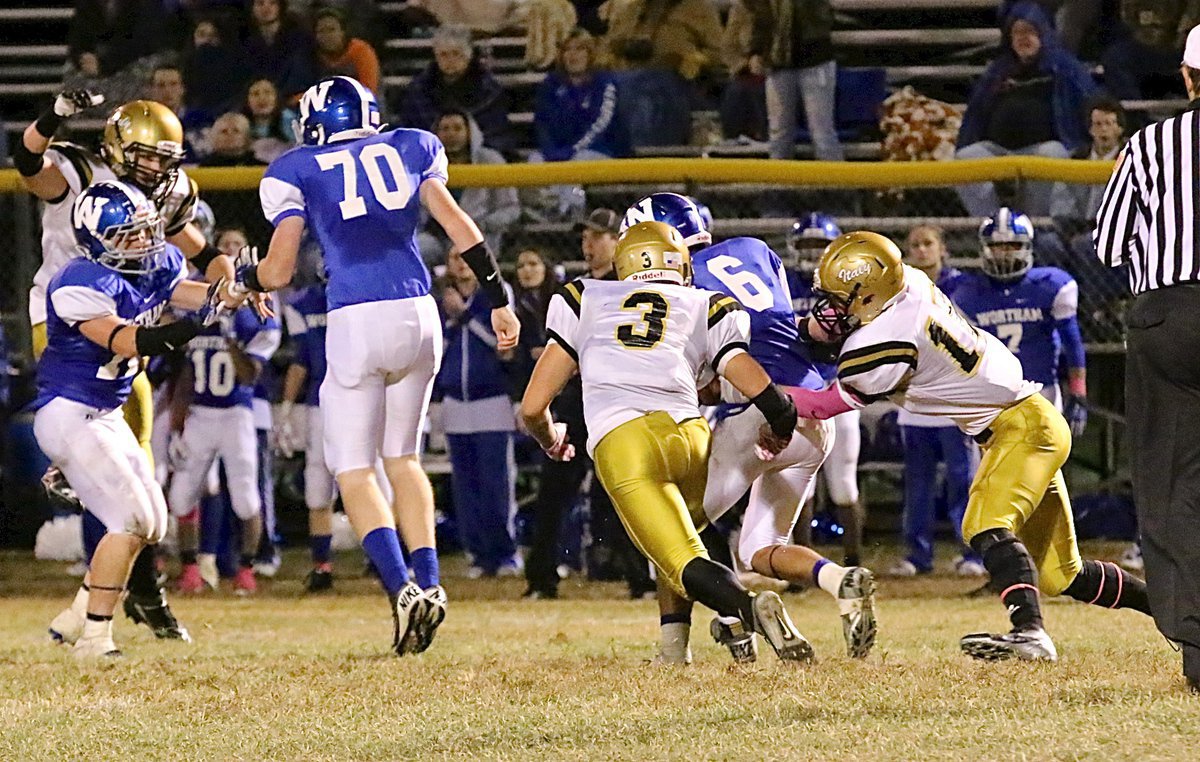Image: Gladiator defensive end Cody Boyd(15) secures his first of three sacks in the remaining moments of the fourth-quarter.