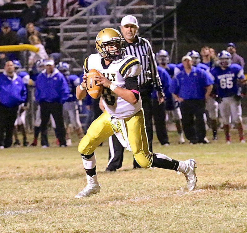 Image: Italy’s Joe Celis(8) rolls out for the conversion try.