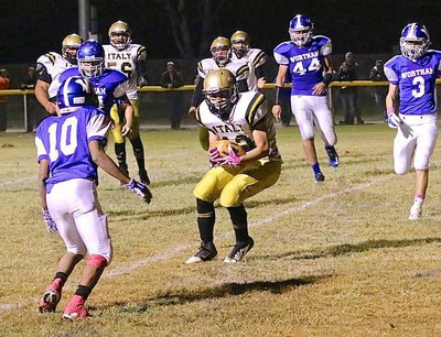 Image: Got it! The pass from Joe Celis is caught by receiver Kyle Tindol(12) for a crucial 2-point conversion, 14-7 Italy.