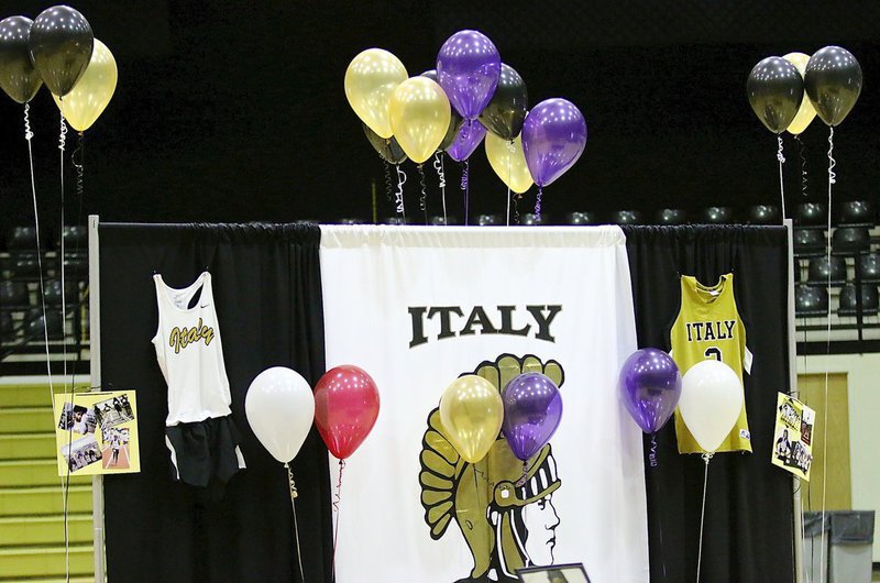 Image: Italy Coliseum adds a touch of purple to its gold and black decor in support of senior student-athlete Kortnei Johnson who officially signed her letter of intent to run track for the LSU Lady Tigers in 2015.