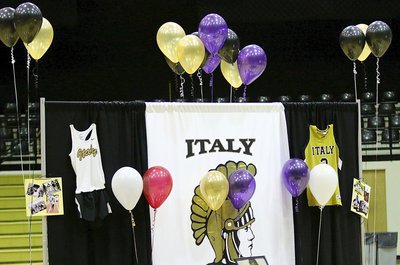 Image: Italy Coliseum adds a touch of purple to its gold and black decor in support of senior student-athlete Kortnei Johnson who officially signed her letter of intent to run track for the LSU Lady Tigers in 2015.