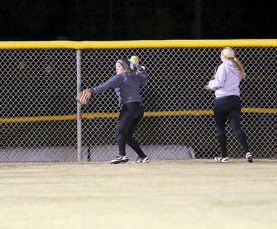 Image: Hannah Washington hurries the ball in for Italy after a hit into left field.
