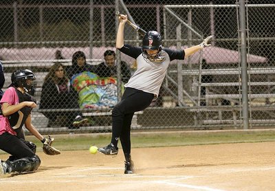 Image: Italy’s Brycelen Richards is hit by a pitch and allowed to take first base.
