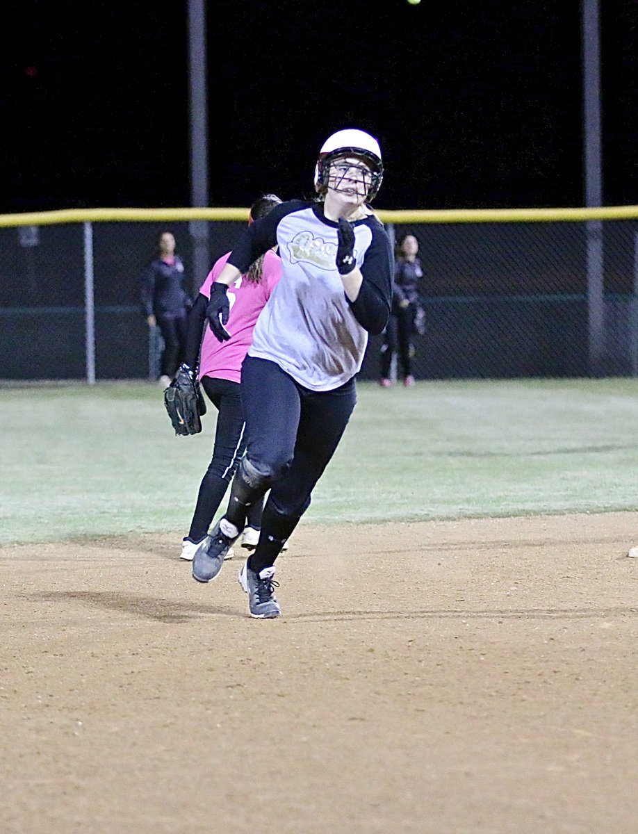 Image: Madison Washington rounds the bases for a triple late in the contest.