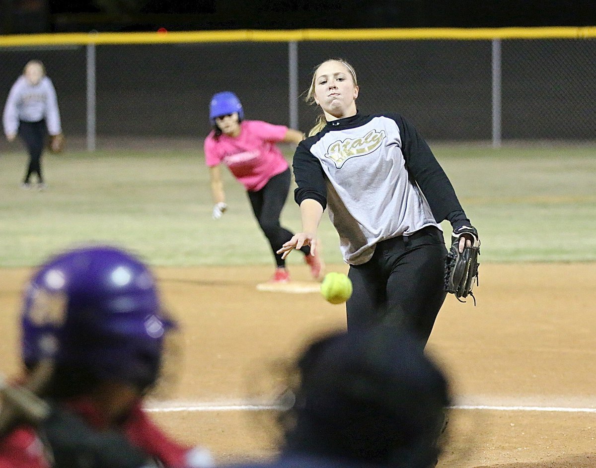 Image: Clinging to a 3-2 lead, Italy pitcher Jaclynn Lewis overcomes the pressure of the moment to lead Italy to a tournament championship.
