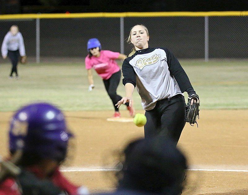 Image: Clinging to a 3-2 lead, Italy pitcher Jaclynn Lewis overcomes the pressure of the moment to lead Italy to a tournament championship.
