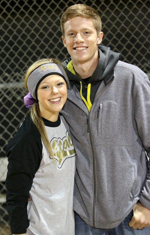 Image: Italy’s Bailey Eubank gets congratulated by Palmer’s Ty Mitchell after Italy’s softball ladies defeated South Grand Prairie in the 2014 CHGSA Fall Classic Championship game, 3-2.