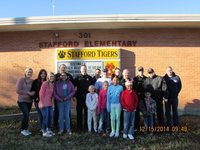 Image: Front row: Bailey Eubank, Oralia, Taylor, Kaylee, Shamiyah, Isaac, JR
Back Row: Madison Washington, Alexis Sampley, Officer Elliott, Chief Martin, Firefighter Kimmons, Capt. Cate, Officer Click, Officer Saxon, Sgt Pitts, Officer Cherry, Lt B. Chambers