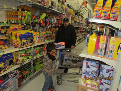 Image: Officer Cherry and JR shopping