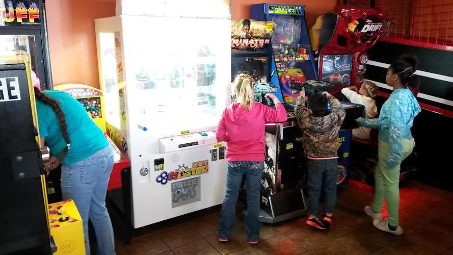 Image: Oralia, Kaylee, JR , Shamiyah and Taylor playing games at Cici’s Pizza.