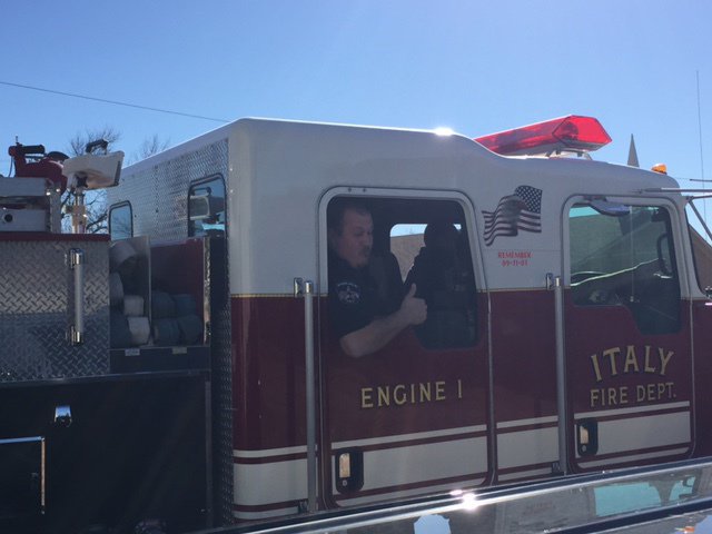 Image: Officer Elliott practicing being a fireman
