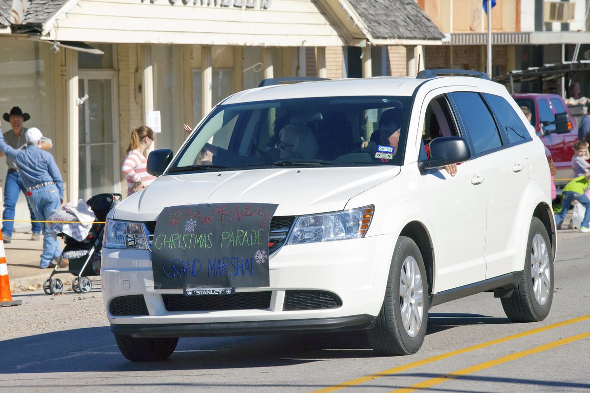 Image: Driver Brian Mathiowetz escorts Italy’s 2014 Christmas Parade Grand Marshall Altha McNeely along the parade route.