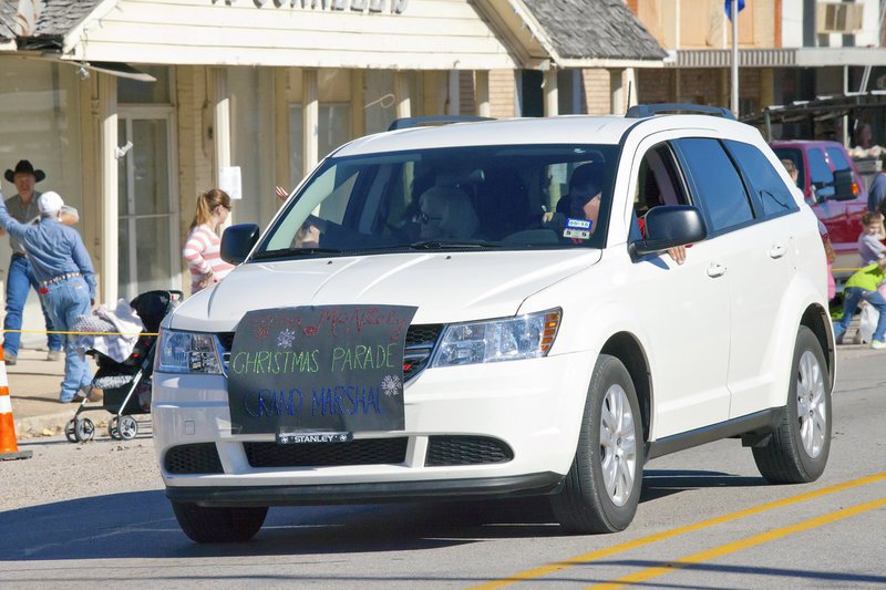 Image: Driver Brian Mathiowetz escorts Italy’s 2014 Christmas Parade Grand Marshall Altha McNeely along the parade route.