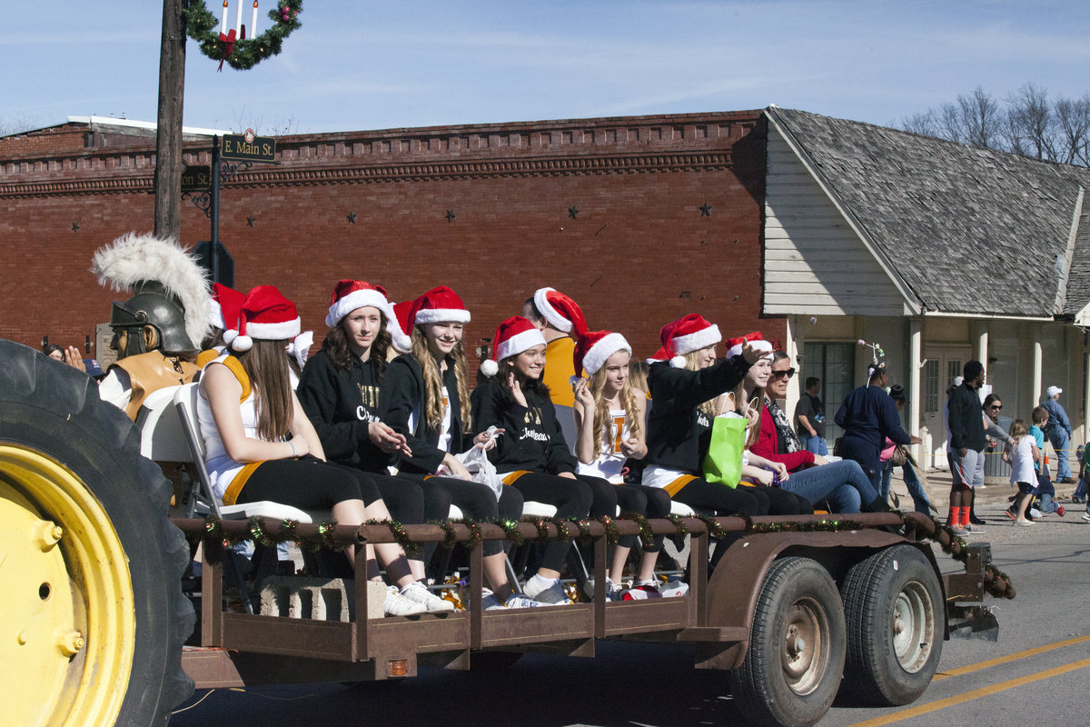 Image: A better view of Italy’s cheerleaders as they toss candy to the parade route crowds.