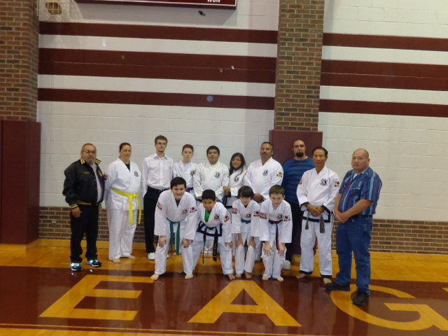 Image: Pictured are the following students, Masters and instructors.
    Top row:  Master Charles Kight-Hillsboro, Jennifer Procopio-Italy, Kevin Devers-4th Degree Black Belt-West,  Michael Russell-Italy, Mario Perez, Black Belt-Milford, Isamar Perez-Black Belt-Milford, Roger Sam-Italy, Master Kevin Kight-Lorena, Grand Master Park-Houston, and
    David Jones-Malone.
    Second  Row:  Rocklin Ginnett-Italy, Nick Sam-Black Belt-Italy, Antonio Procopio-Italy, and Jacob Young-Hubbard