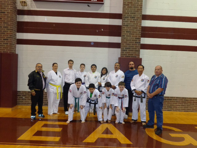 Image: Pictured are the following students, Masters and instructors.
    Top row:  Master Charles Kight-Hillsboro, Jennifer Procopio-Italy, Kevin Devers-4th Degree Black Belt-West,  Michael Russell-Italy, Mario Perez, Black Belt-Milford, Isamar Perez-Black Belt-Milford, Roger Sam-Italy, Master Kevin Kight-Lorena, Grand Master Park-Houston, and
    David Jones-Malone.
    Second  Row:  Rocklin Ginnett-Italy, Nick Sam-Black Belt-Italy, Antonio Procopio-Italy, and Jacob Young-Hubbard