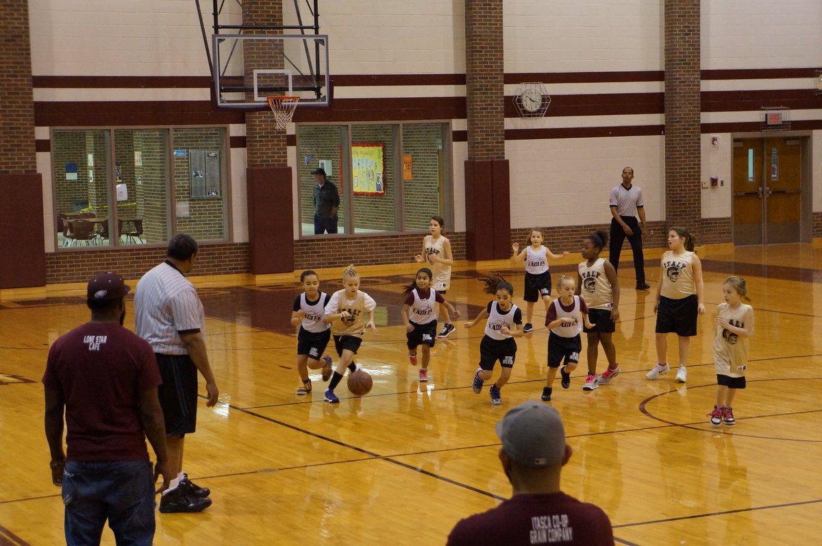 Image: Kaylee drives the ball past the Eagle defense.