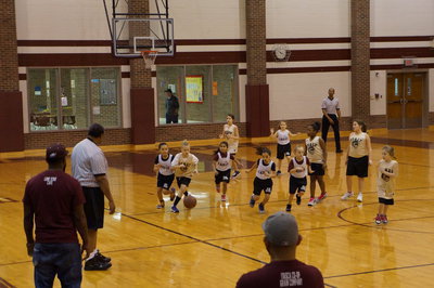 Image: Kaylee drives the ball past the Eagle defense.