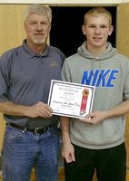 Image: Italy Gladiator senior Cody Boyd was chosen as an Honorable Mention member of the 2014-2015 Academic All-State Team as voted on by the Texas High School Coaches Association in conjunction with the United States Marine Corps. Boyd had a 3.207 GPA during his senior season and maintained a 92 GPA or higher throughout all four years of high school. Presenting Boyd with his certificate is Italy High School Athletic Director/Head Football Coach Charles Tindol.