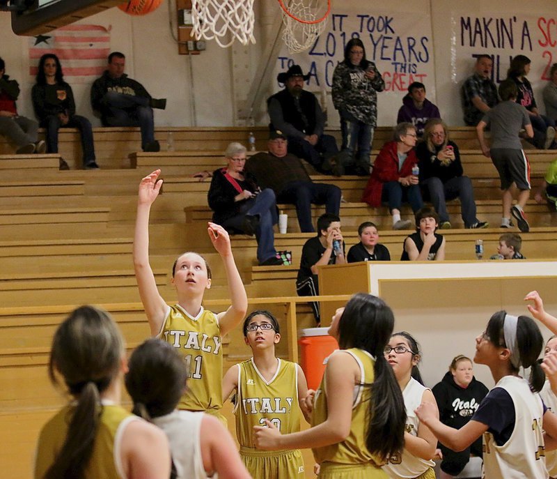 Image: Lana Beets(11) gets an open look under the basket for the Italy A team.