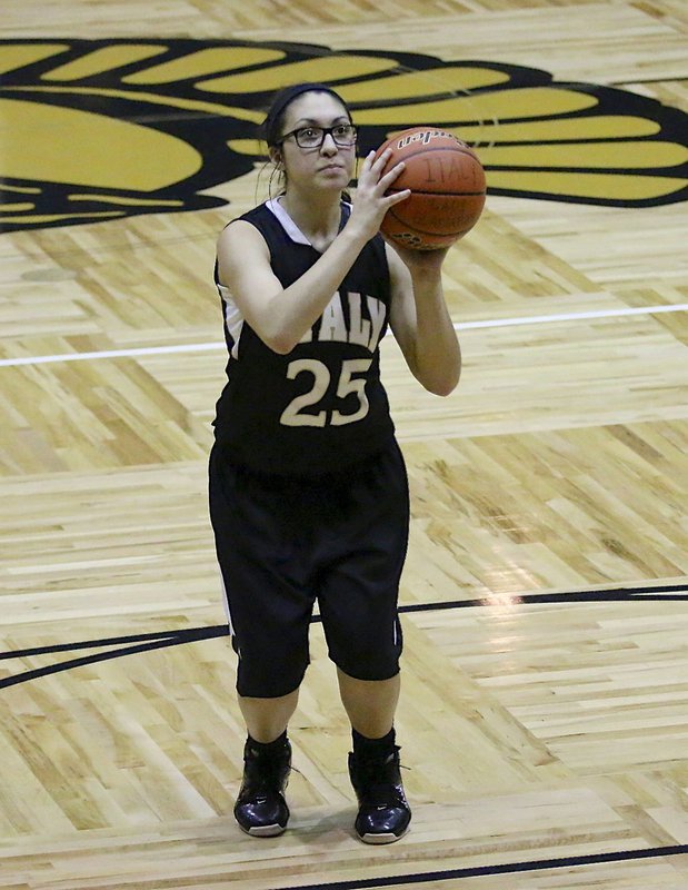 Image: Lizzie Garcia(25) helps seal the tournament championship for Italy with free-throws late in the contest.