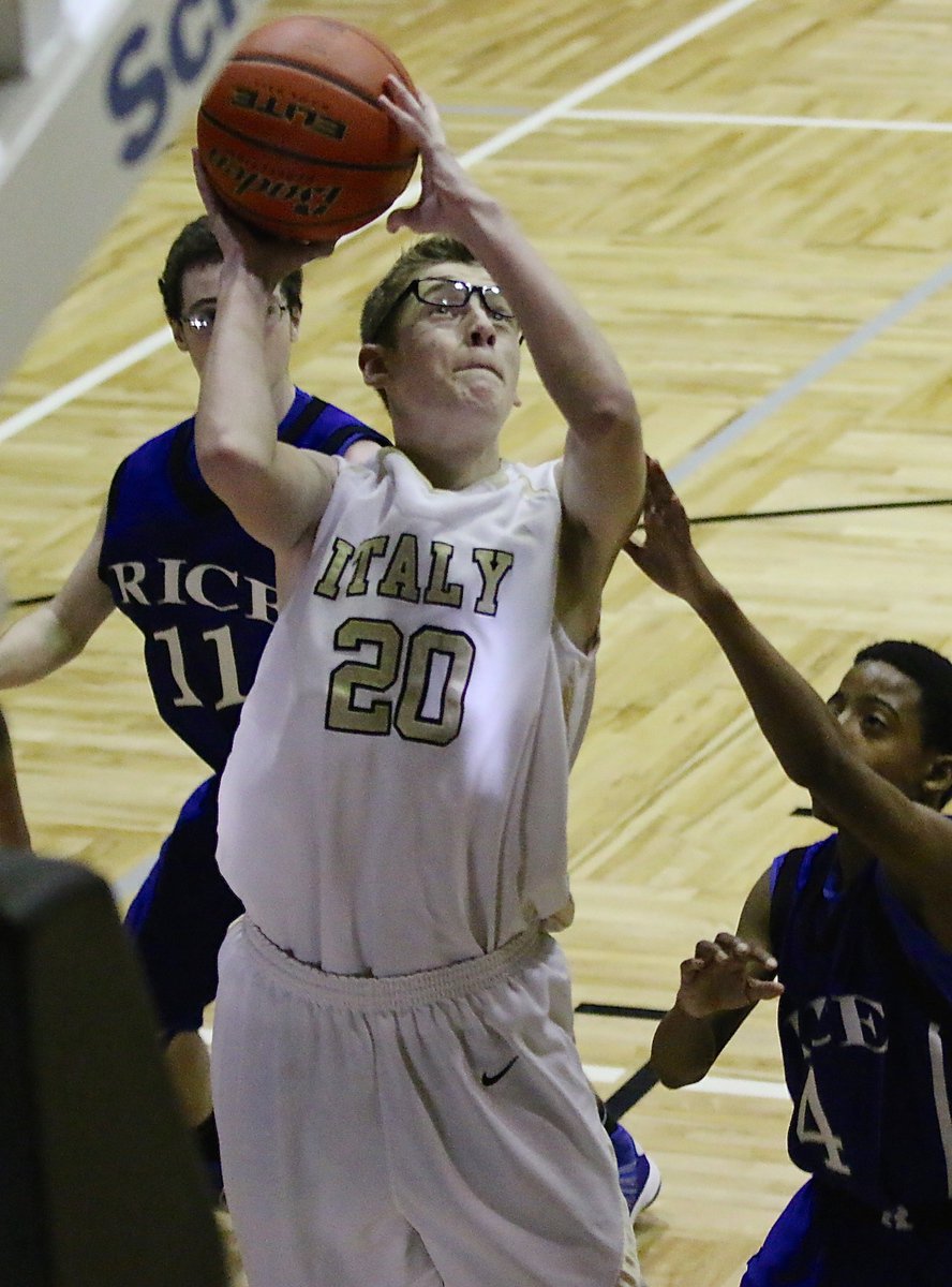 Image: JV Gladiator Michael Hughes(20) keeps the pressure on the Rice defense.