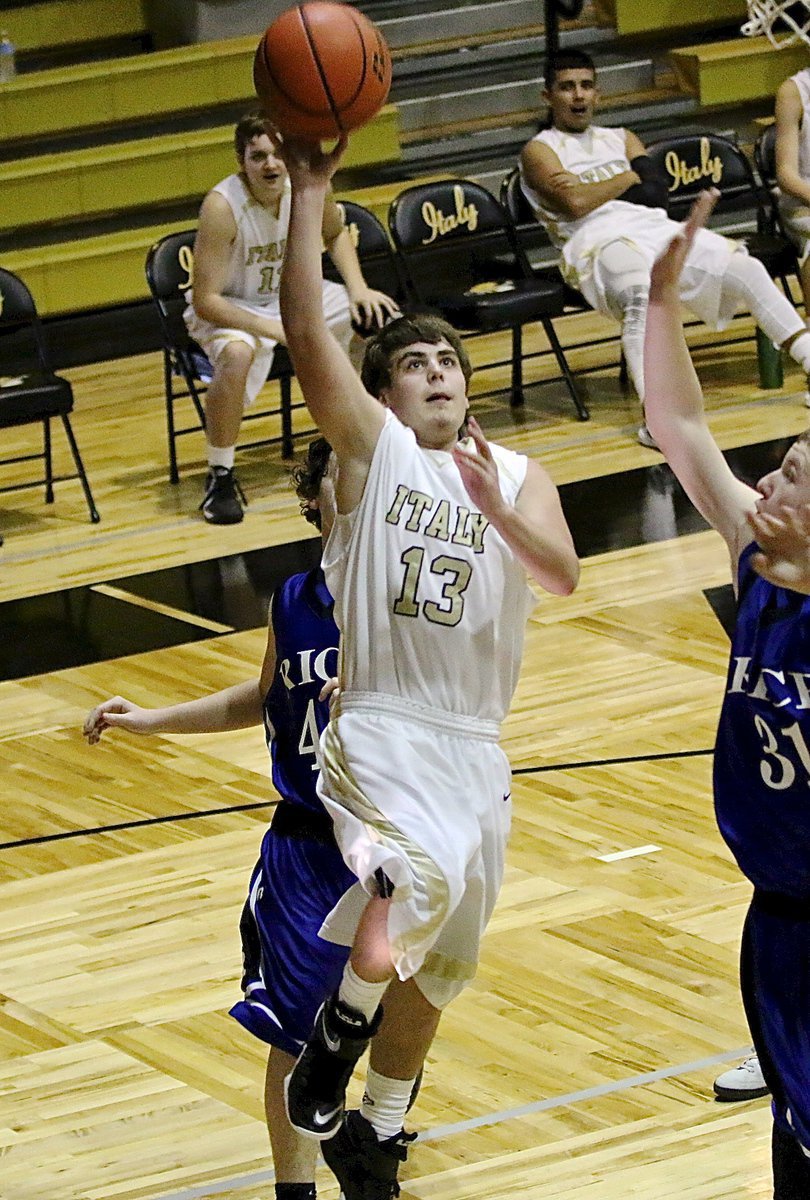 Image: Cade Roberts(13) scores 2-points for the JV Gladiators to help secure a 44-30 win over Rice. The JV Gladiators finished with a 1-1 mark in the tournament.