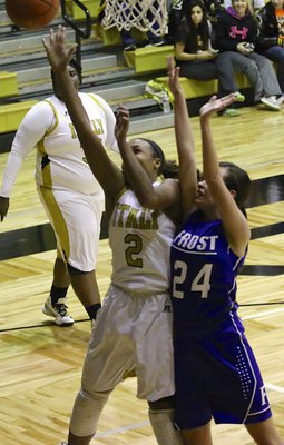 Image: Italy freshman Emmy Cunningham(2) goes up strong for 2-points in the first period.