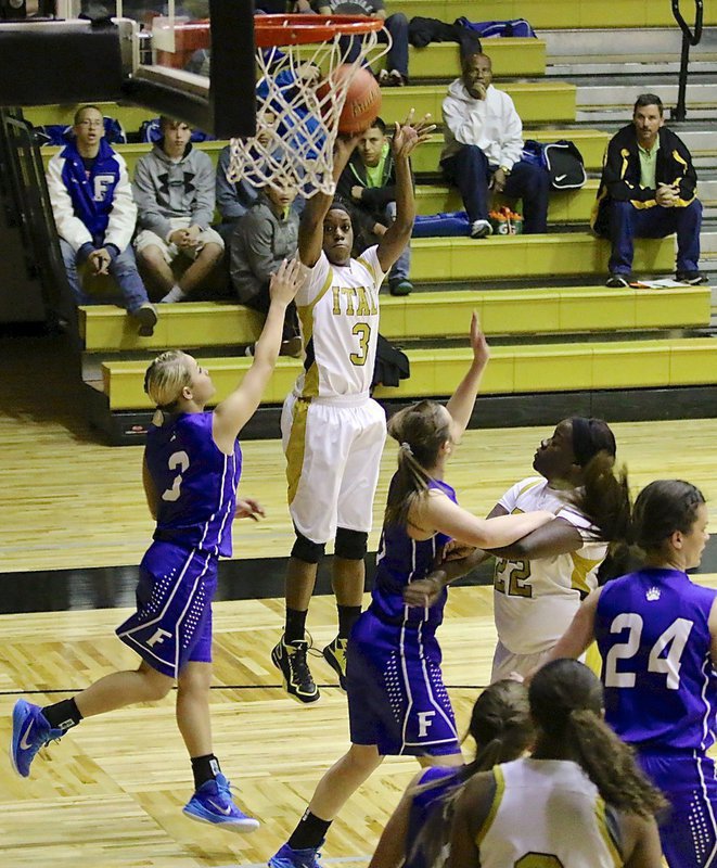 Image: Kortnei Johnson(3) gives Italy an early lead.