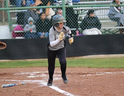 Image: Italy’s senior slap-hitter Bailey Eubank(1) hits and runs toward first-base.