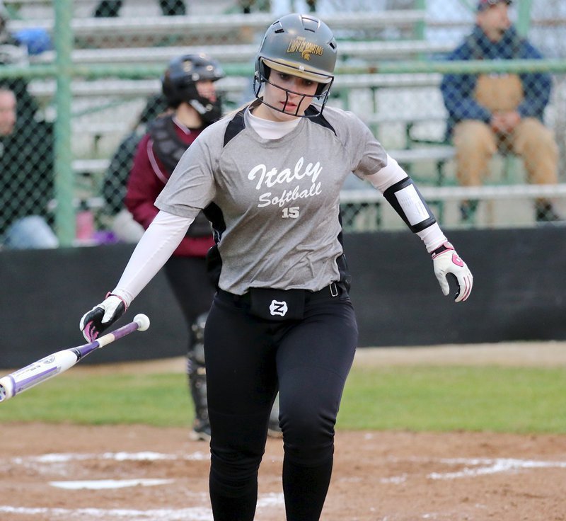 Image: Italy’s Jaclynn Lewis(15) heads to first-base after being walked.