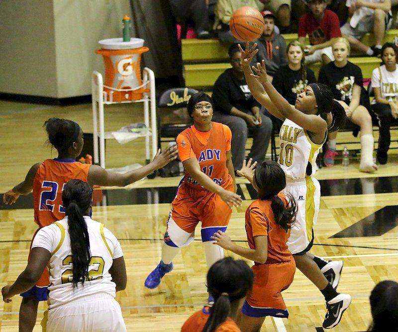 Image: Senior guard K’Breona Davis(10) takes a running jumper after getting into Gateway’s lane.