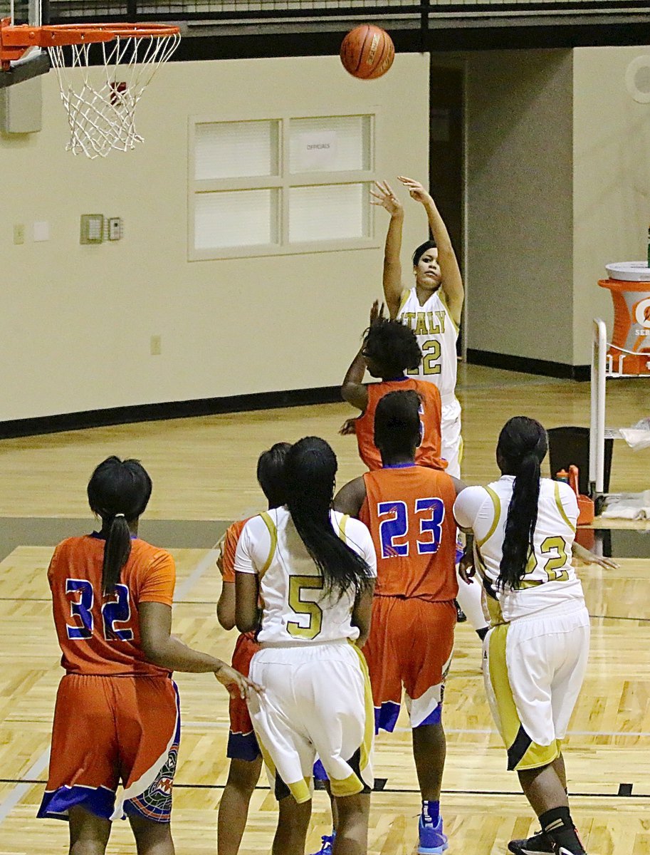 Image: Alex Minton(12) takes a jumper for the Italy cause against Dallas Gateway.