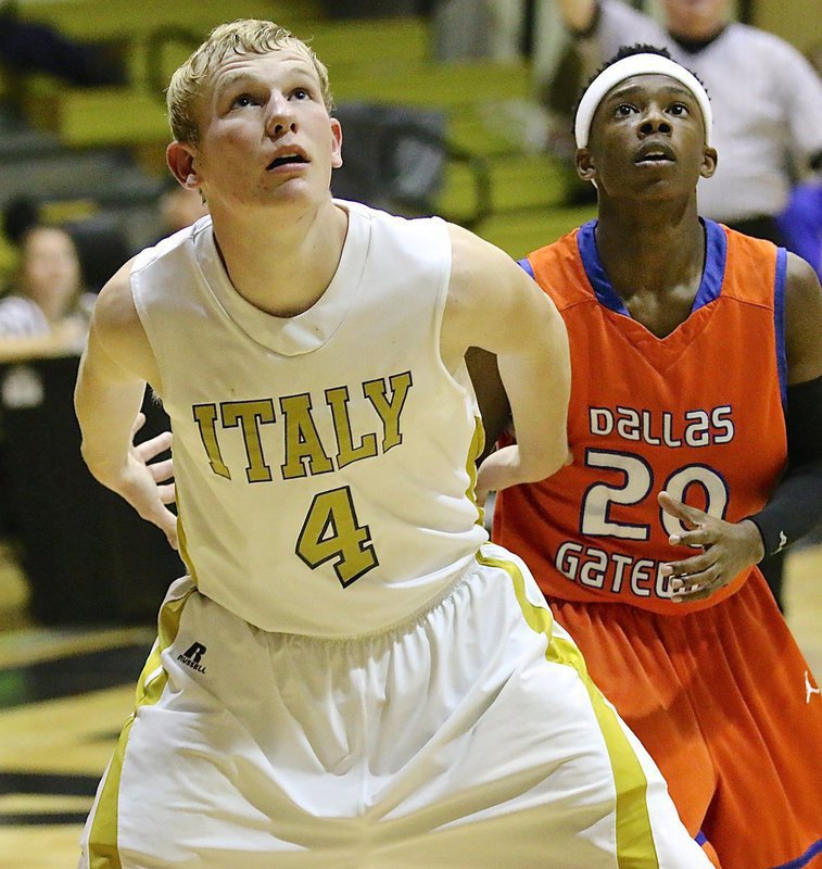 Image: Senior Gladiator Cody Boyd(4) blocks out a Gator during a free-throw.