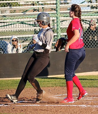 Image: April Lusk(7) scores a run for the Lady Gladiators during the scrimmage against Red Oak Life.