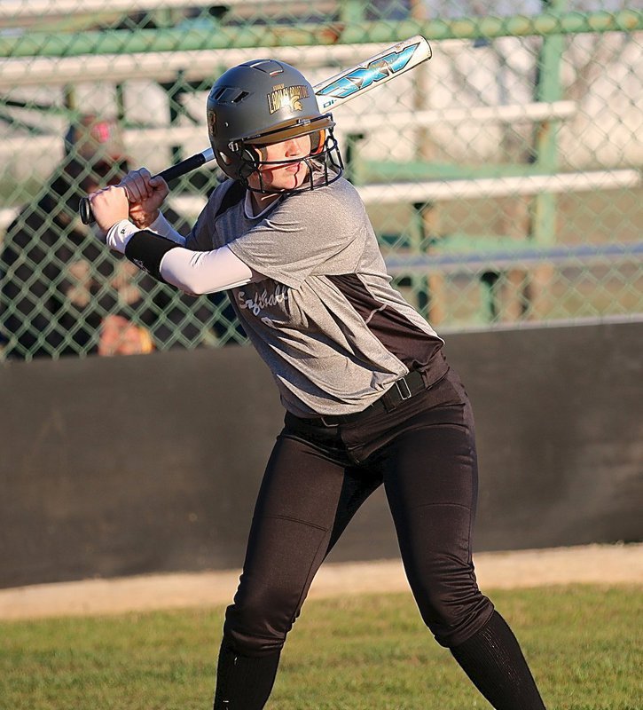 Image: Hannah Washington(8) comes thru with a three-baser for the Lady Gladiators.