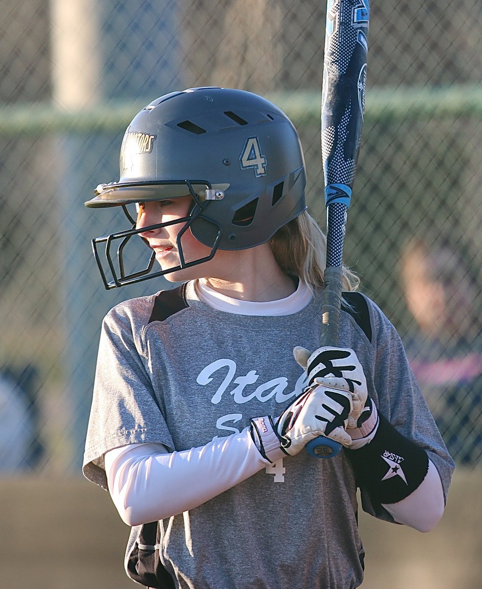 Image: Lady Gladiator Britney Chambers(4) eyes the Red Oak Life pitcher as she readies at the plate.