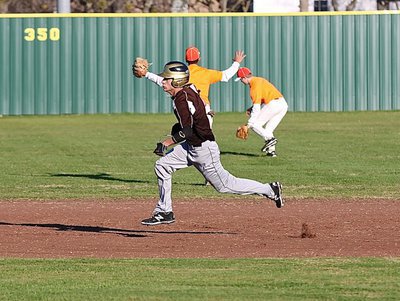 Image: Levi McBride stretches out a triple for the Gladiators while leaving a wake of sand behind him.